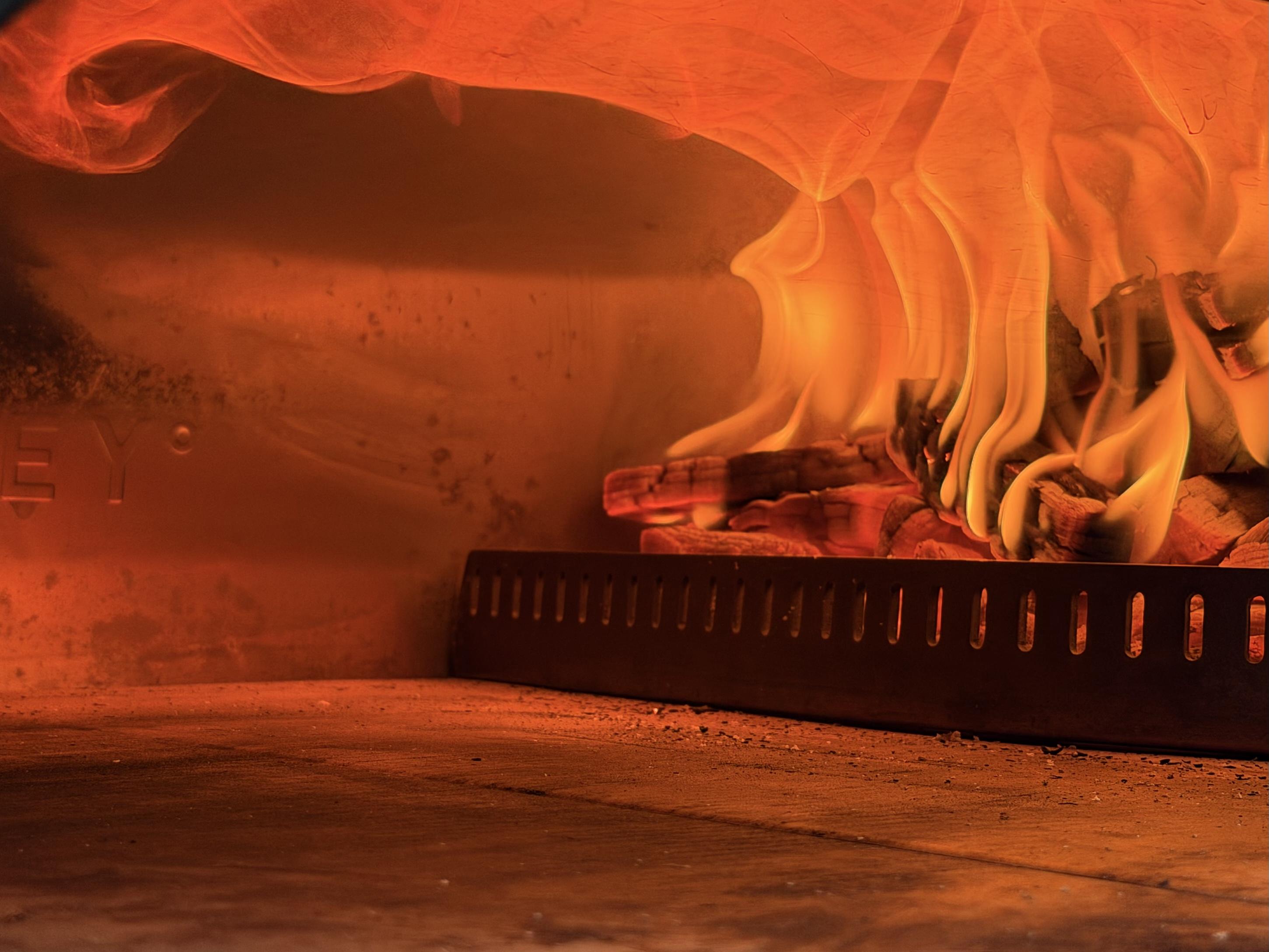 Roaring flame of the pizza oven